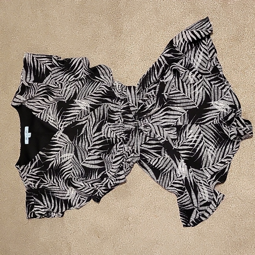 Ruffled Romper with belt and snap front closure